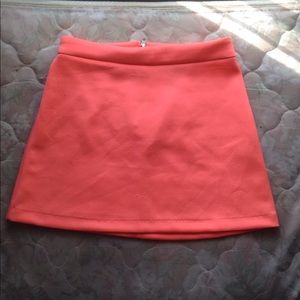 Neon pink mini skirt